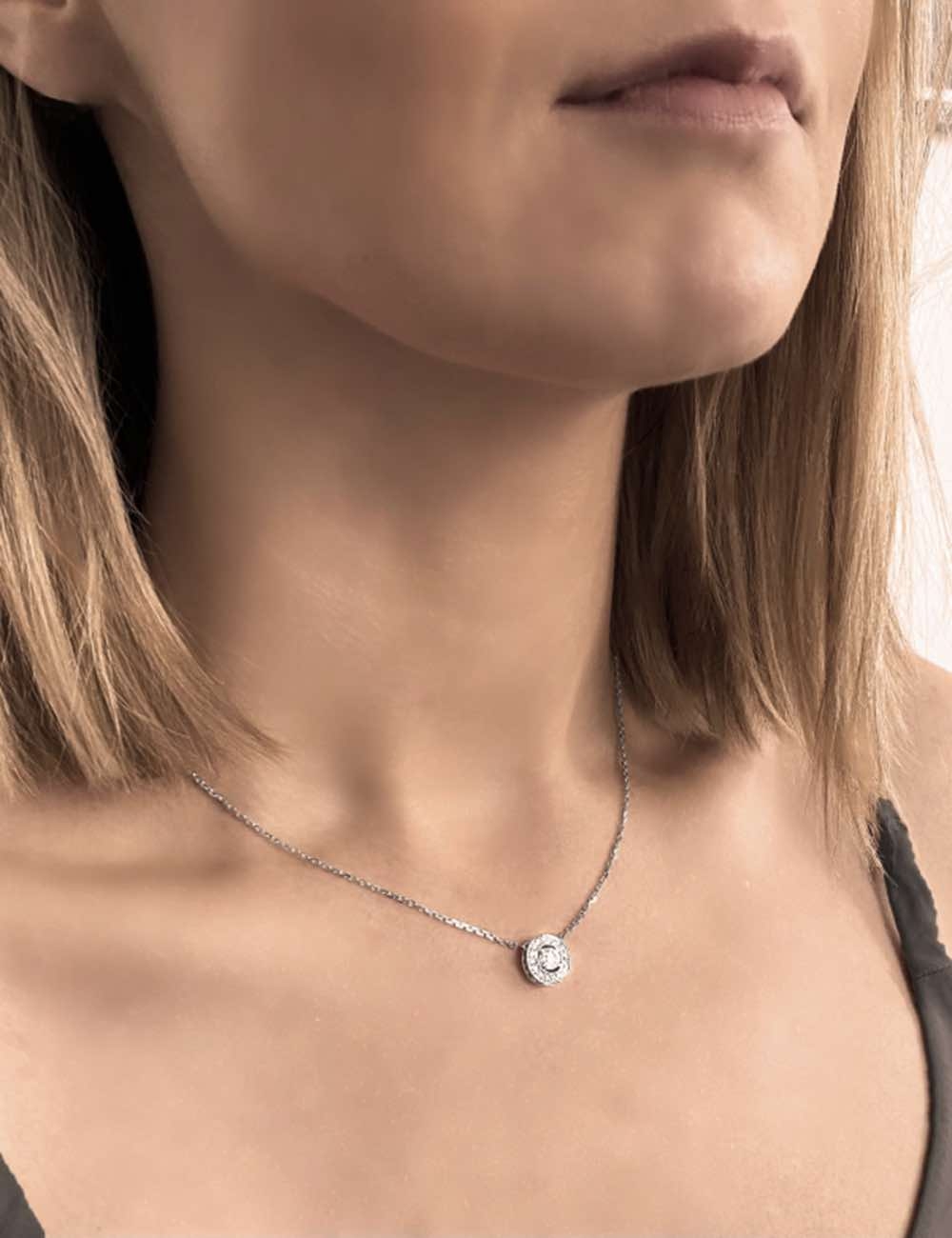 Luxury 0.40ct white diamond necklace, radiant halo, ethical. Timeless elegance and refinement.