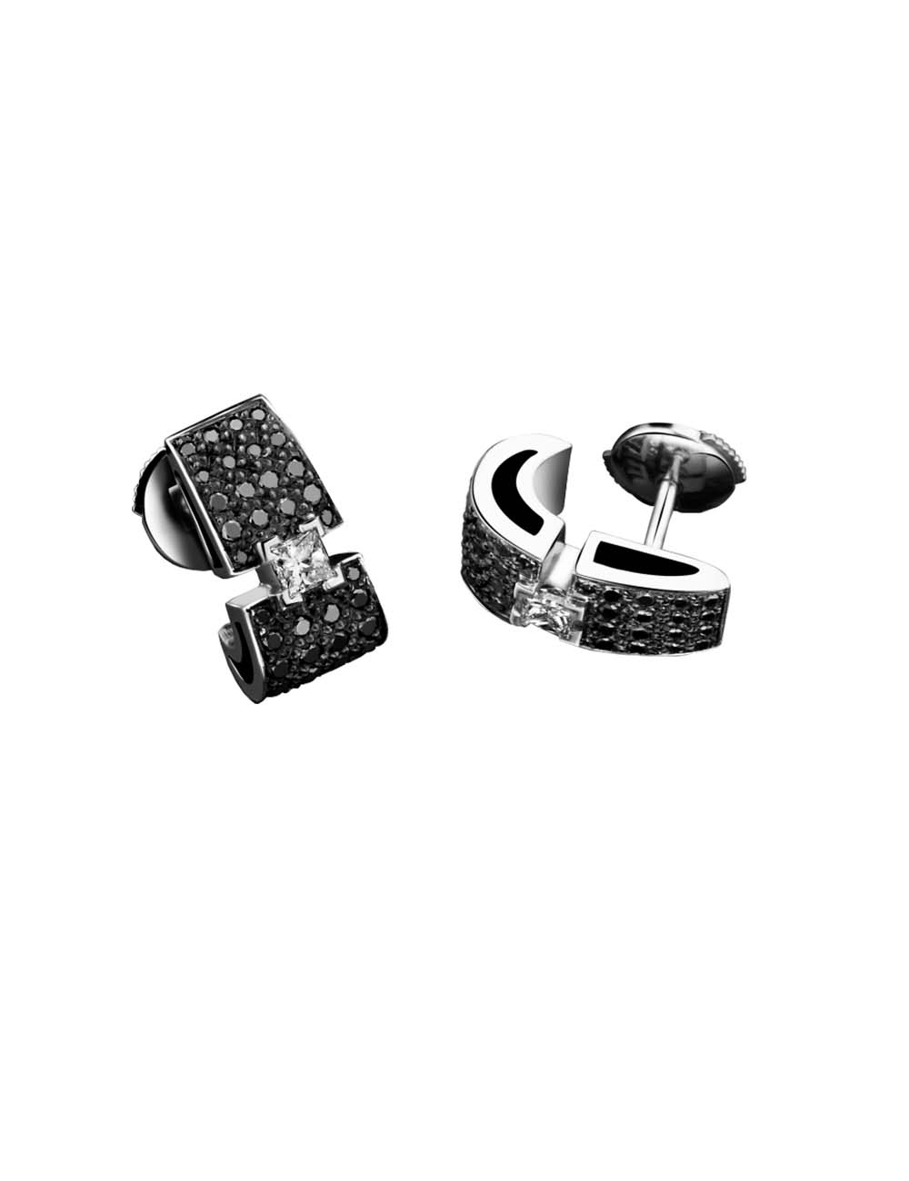 Modern elegance with white gold earrings and white and black diamonds.