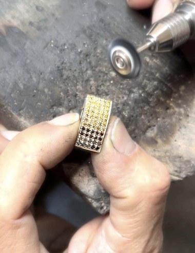 Gradient diamonds on the Magma pendant transitioning from deep red to orange and then to bright yellow.