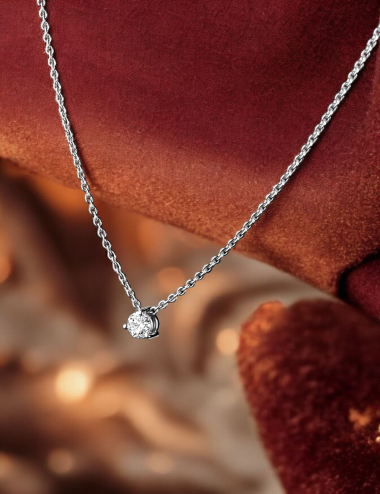 White gold solitaire pendant with a natural white diamond, perfect for an elegant and timeless look.