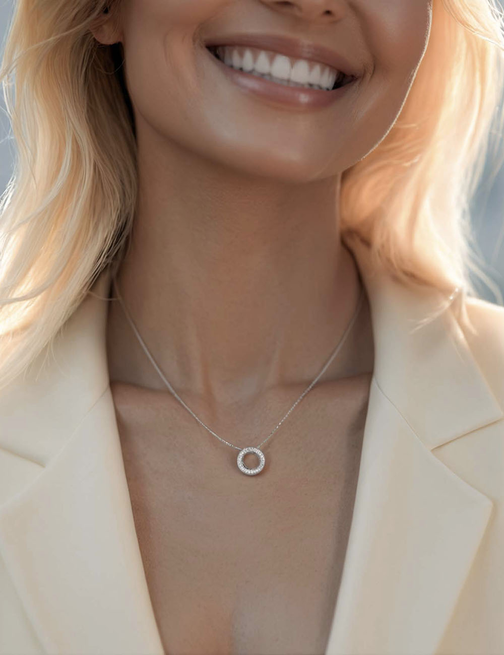 Elegant DayLight Circle women's pendant by D.Bachet, set with sparkling white diamonds.