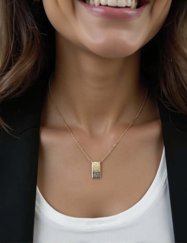 Modern and bold jewelry creation by D.Bachet, Magma pendant in yellow gold with colored diamonds.