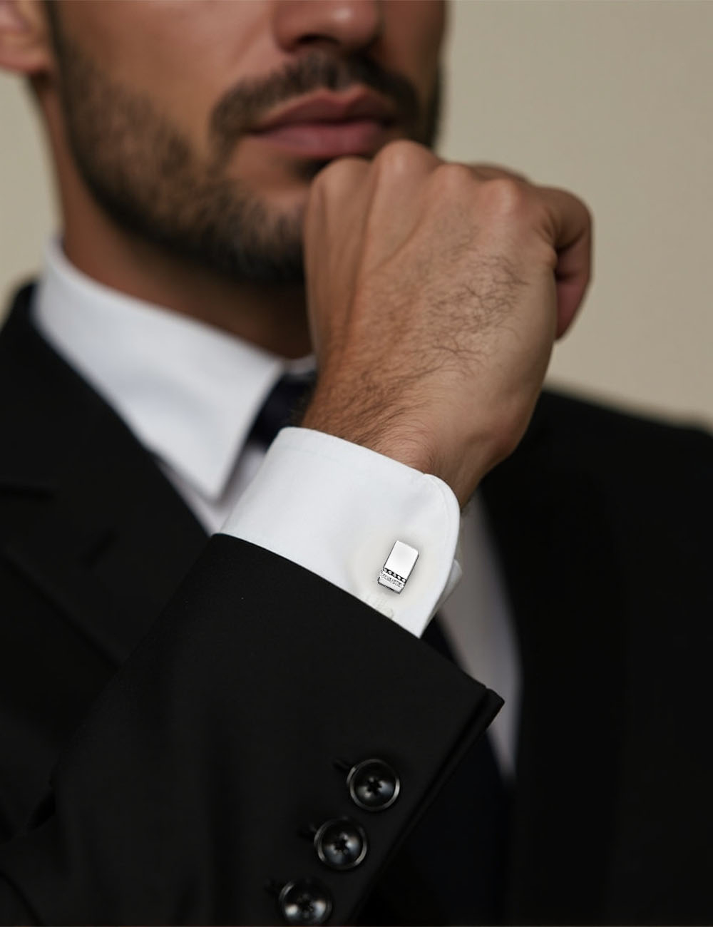 Dynamik white gold cufflinks with white and black diamonds, modern and refined design.