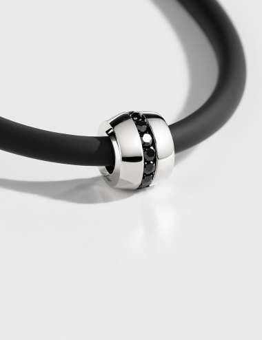 Modern necklace for men in gold 18k, black diamonds and black silicone cord with gold clasp.