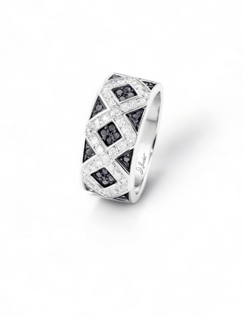 Prisma, a platinum ring with a geometric design, adorned with black and white diamonds, embodying elegance and sophistication.